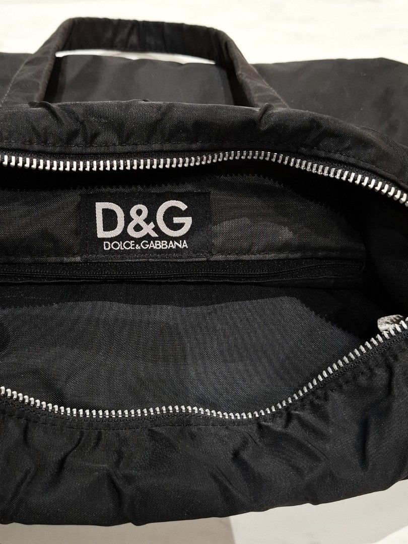 90's Dolce Gabbana Vintage Logo Nylon Shoulder / Hand Bag (Guaranteed Authentic) (Category: Luxury Bags & Wallets) located in Pasig City. Submitted by coveted.mnl (Listing ID 1468148290, Image 3). Description: Guaranteed Authentic Vintage Piece📌 (90's) Width : 14 Height : 11 Base : 5 (MEASURED BY INCHES) 9.5/10 overall condition No issues or flaws in fabric • P4500 Slightly negotiable • Pasig City meet up • Open for COD Via Lalamove or Grab • J&
