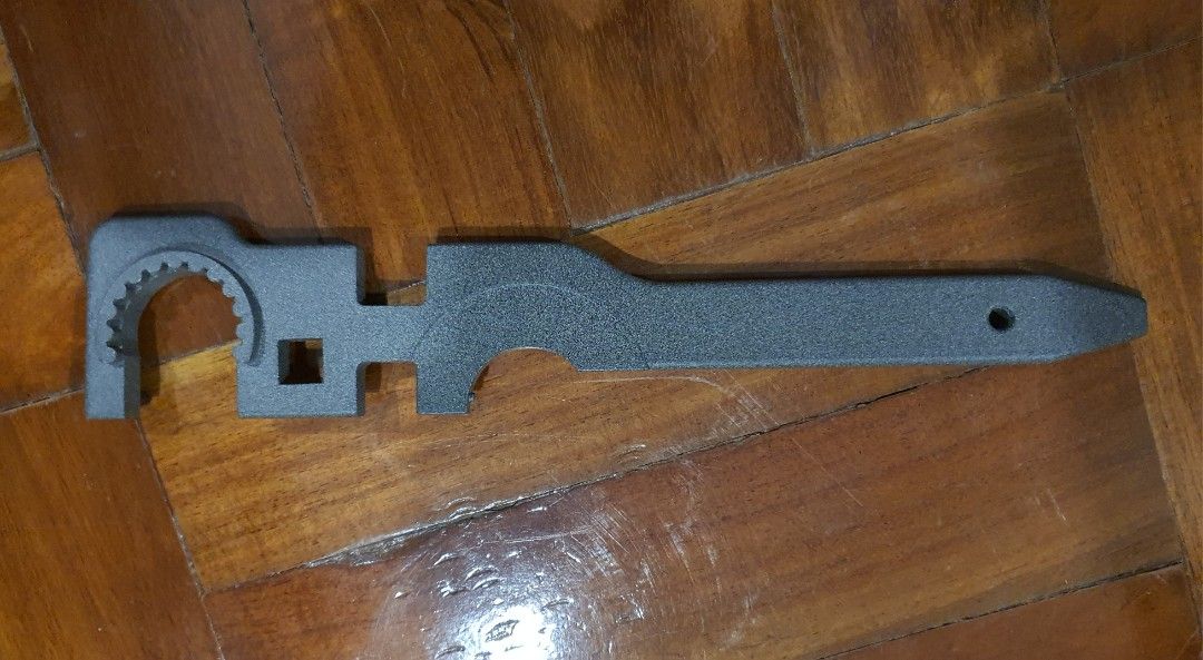 DPMS AR-15 Armorers Wrench Multi-Tool (Category: Construction Tools & Equipment) located in Pasay City. Submitted by rsar888 (Listing ID 1468133835, Image 3). Description: - Genuine DPMS armorer's wrench for AR-15 assembly and maintenance - Heavy-duty steel construction with a durable textured grey finish - Built-in slots for standard barrel nuts and castle nuts - Integrated square cutout compatible with torque wrenches - Features the authentic s