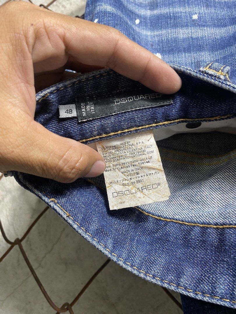 Dsquared Distressed Paint Splatter Denim Jeans Size 48 (Category: Jeans) located in Cabanatuan. Submitted by adrialesdrip (Listing ID 1468216320, Image 3). Description: - Authentic Dsquared2 designer denim jeans - Size: 48 (Made in Italy) - Medium blue wash with trendy distressed finish - Unique white paint splatter details across the front - Classic button fly closure with branded hardware - Signature red logo tab detail Measurements W 34 L 39.5