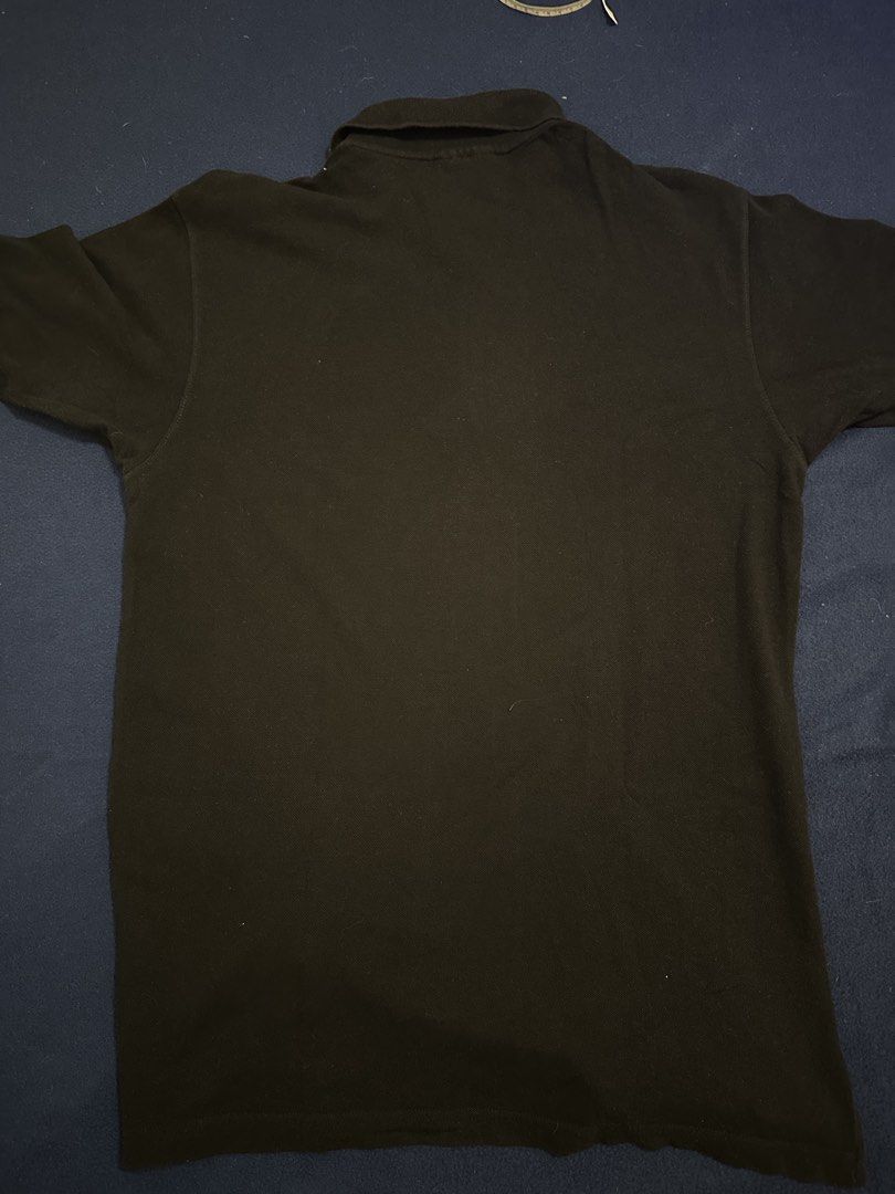 Ducati polo shirt (Category: Tshirts & Polo Shirts ) located in Quezon City. Submitted by mancave_stuff (Listing ID 1468185138, Image 2). Description: Ducati Performance short-sleeve polo shirt in a classic solid black colorway. Perfect for casual streetwear, bike meets, or everyday casual wear. • Condition: Preloved / Well-used (Shows normal signs of wear, giving it a great vintage look, but no major flaws) • Design: Clean minimalist look featur