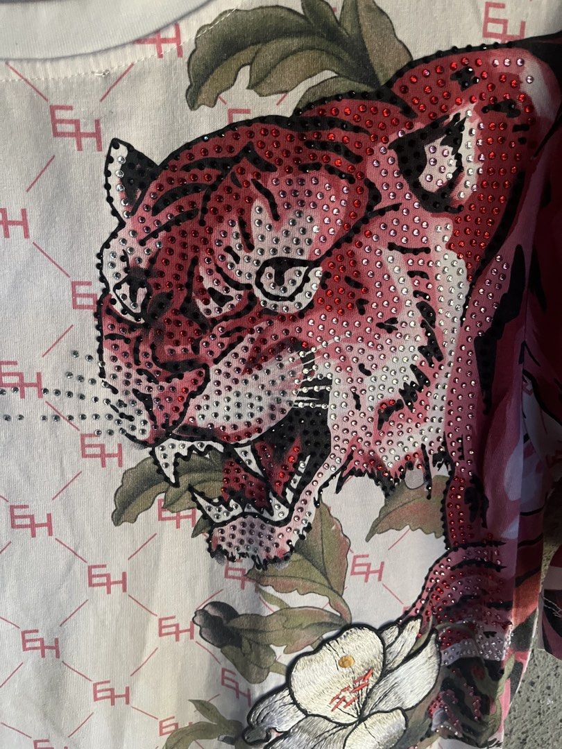 Ed hardy tshirt (Category: Tshirts & Polo Shirts ) located in Gapan. Submitted by xxkaboom (Listing ID 1468138793, Image 3). Description: 20.5x28 dimes Excellent condition Cut tag 9.5 colorate Nueva ecija loc.