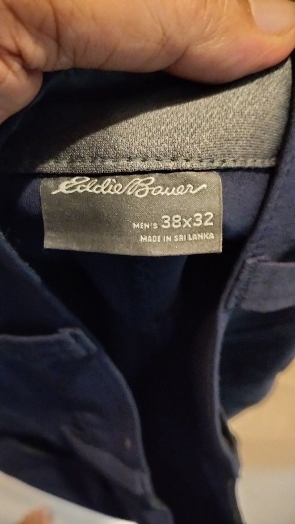 Eddie Bauer Men's Tech Pant 38x32 Navy (Category: Trousers) located in Angeles City. Submitted by mightywhale_13072f (Listing ID 1468174867, Image 3). Description: - Brand: Eddie Bauer - Style: Tech pants - Color: Navy blue - Size: Men's 38x32. actual w36-38.L41 - Material: 95% nylon, 5% spandex blend (lightweight and stretchy) - Features: Belt loops and standard back pockets - Condition: Clean, with original tag still intact inside.