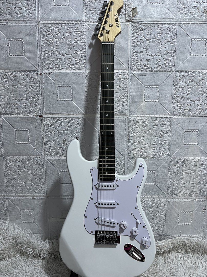 Electric Guitar with amplifier Brandnew (Category: Musical Instruments) located in Manila. Submitted by joharahmauna_18 (Listing ID 1468059176, Image 1). Description: 3,500 only Kawes Electric Guitar with amplifier low action complete accessories | Brandnew w box no issue ✅ Inclusion: Amplifier , Bag, Cable , and extra cable , 2wrench, , Strap ,Tuner , Capo ,3picks/ pickholder , extra string Location:📍Novaliches bayan, Quezon City •Pickup/lalamo
