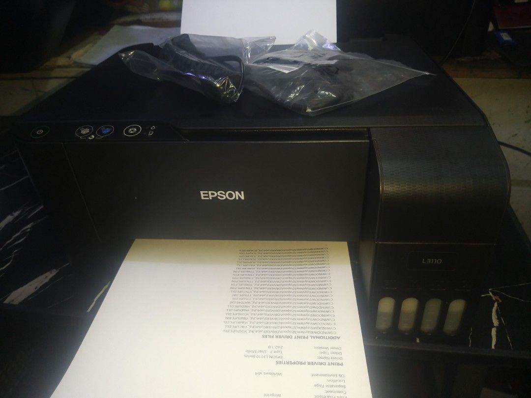 Epson L3110 All-in-One Ink Tank Printer (Category: Printers, Scanners & Copiers) located in Manila. Submitted by haydsryde (Listing ID 1468177743, Image 1). Description: - Model: Epson L3110 (Black) - Functions: Print, scan, and copy with an efficient integrated ink tank system - Condition: Fully tested and 100% operational - Inclusions: Power cable in plastic and a test print page showing clear alignment - Authenticity: Serial number tag intact 