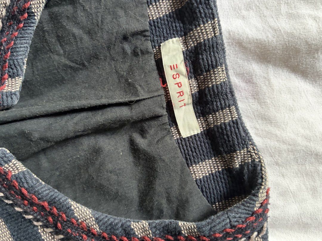 Esprit Striped Open Front Jacket (Category: Coats, Jackets and Outerwear) located in General Santos City (Dadiangas). Submitted by jwtfg (Listing ID 1468110630, Image 3). Description: - Brand: Esprit - Design: Navy blue and cream stripes with structured knit texture - Interior: Fully lined in black fabric - Pockets: 2 front zippered pockets with braided red and navy pulls - Details: Decorative red contrast stitching on the collar and vertical str