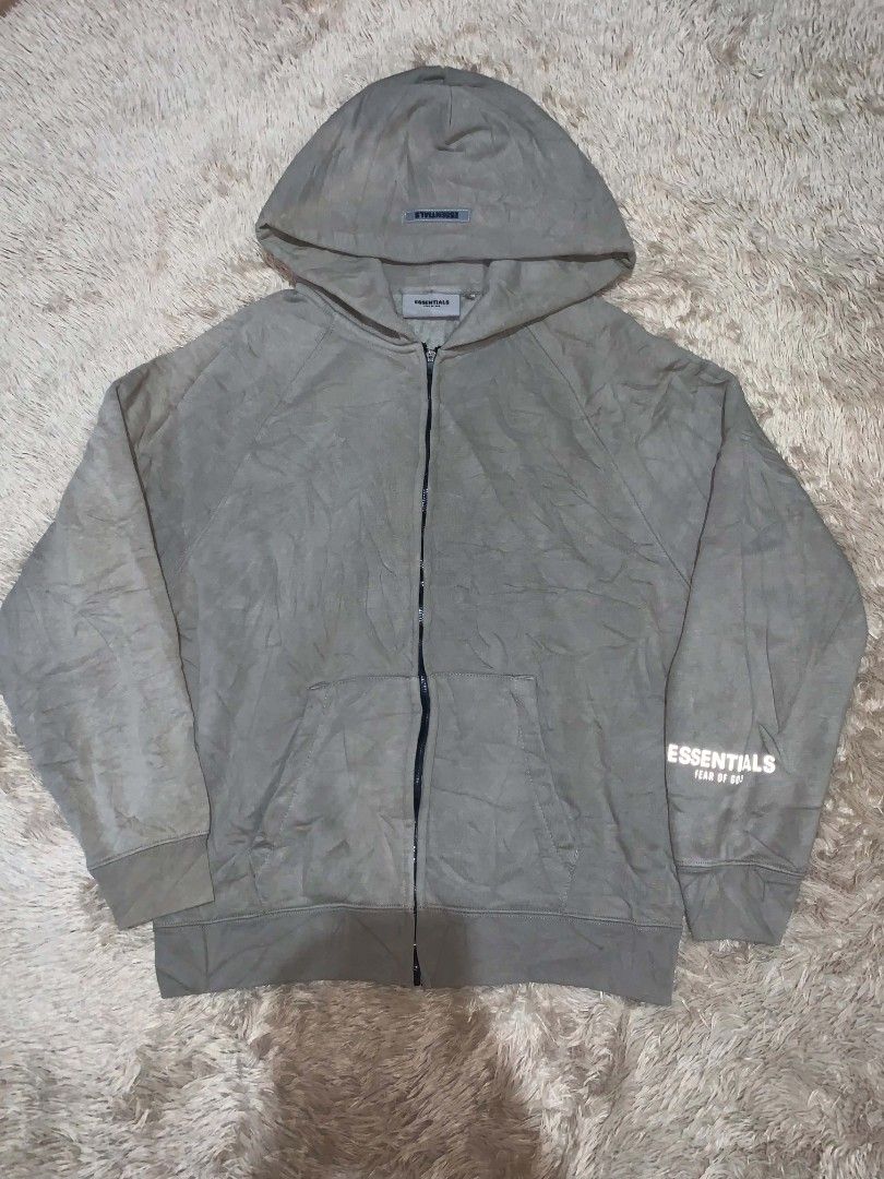 Essentials Zip up Hoodie Jacket (Category: Coats, Jackets and Outerwear) located in Cebu City. Submitted by thrift.by_mar (Listing ID 1468066700, Image 1). Description: - excellent condition - size small on tag but can fit medium - issue good fade.