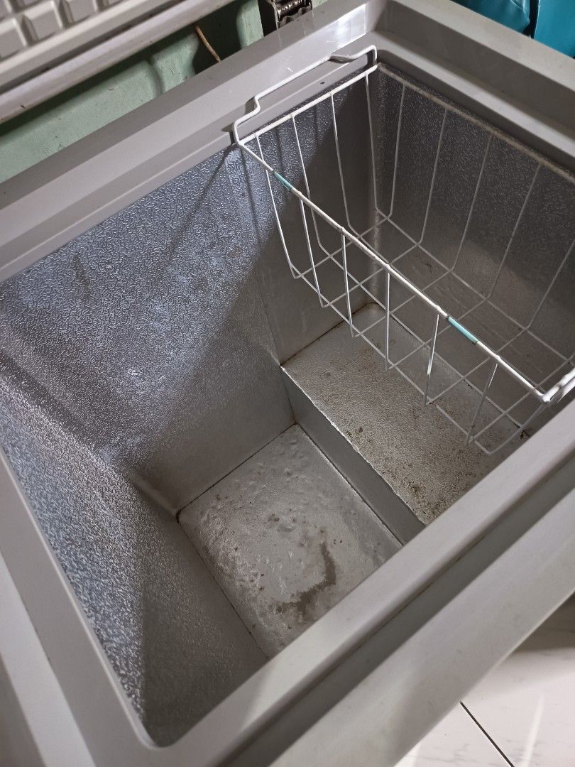 Eureka Chest Freezer (Category: Refrigerators and Freezers) located in Pasay City. Submitted by enajm (Listing ID 1468142791, Image 2). Description: - Brand/Model: Eureka Chest Freezer (White) - Condition: Powers on perfectly, keeps items frozen solid (needs a quick wipe down before use) - Features: Front temperature dial, indicator lights, textured interior walls, and a removable wire storage basket - Capacity: Great size for extra home storage 