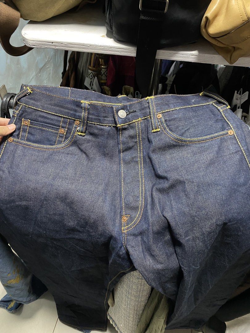 Evisu Selvedge Jeans (Category: Jeans) located in Mangatarem. Submitted by juicybabe_ (Listing ID 1468244846, Image 2). Description: - Size: 32 - Fit: Straight leg cut - Material: 100% cotton - Details: Painted pink and purple gull wings on back pockets, yellow contrast stitching, leather patch on back waistband - Closure: Button fly.