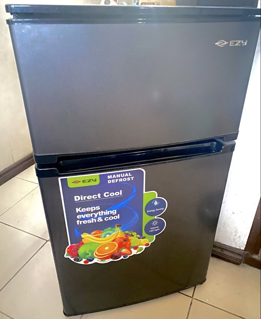 EZY 2-Door Personal Refrigerator / Mini Fridge (Category: Refrigerators and Freezers) located in Las Pinas. Submitted by eelllla026 (Listing ID 1468130519, Image 1). Description: RFS: Need urgent cash Key Features & Highlights Brand: EZY Type: 2-Door Personal Refrigerator / Direct Cool Color: Dark Gray / Charcoal Finish Freezer: Dedicated Top Freezer Compartment Features: Energy-saving, low noise, interior LED lighting, and manual defrost system.