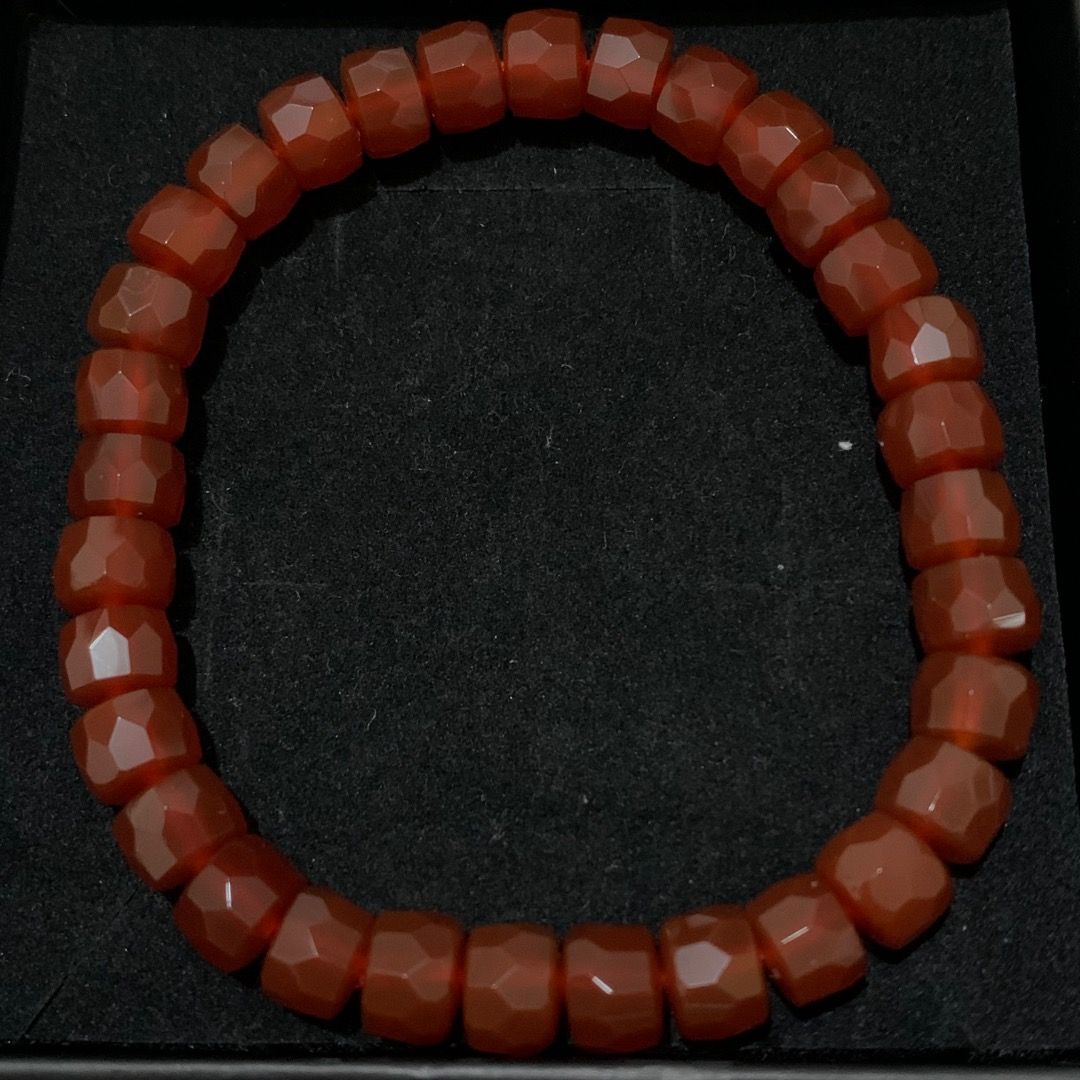 Faceted Carnelian Bead Stone Bracelet (Category: Bracelets) located in Quezon City. Submitted by itscxyy (Listing ID 1468066696, Image 2). Description: - High-Quality faceted carnelian stone beads with a deep orange-red color - Multi-cut surfaces that beautifully catch the light - Stretchy cord design fits most wrist sizes easily - Versatile piece, great for stacking or wearing solo.