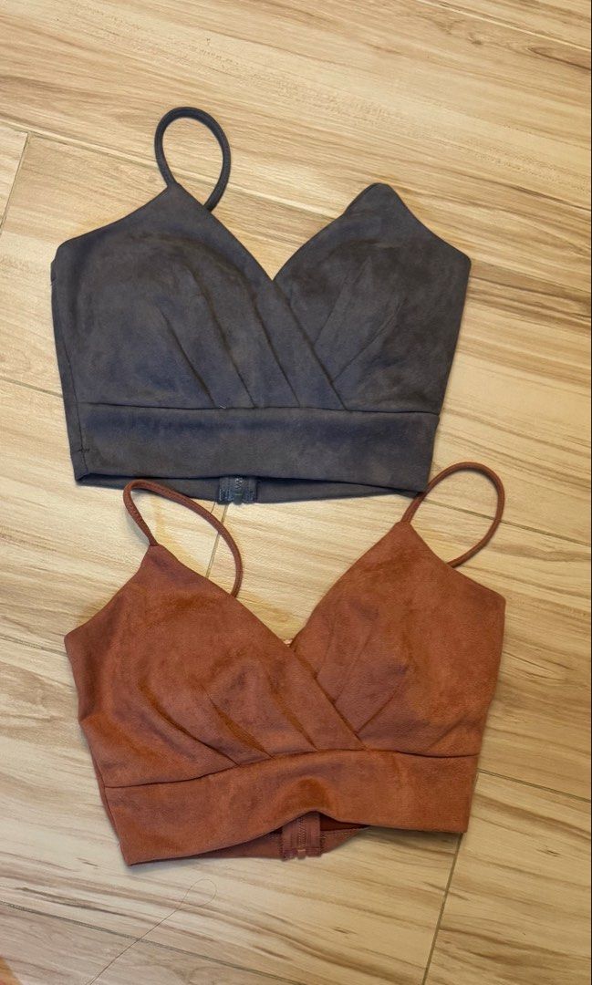 Faux Suede Crop Top Bundle (Category: Sleeveless) located in Makati City. Submitted by declutter_forsale (Listing ID 1468204761, Image 1). Description: ₱180 each ₱300 take both - Size S (with pads) - Style: Set of 2 cropped camis tops - Material: Soft faux suede fabric - Colors: Charcoal grey and rust brown - Design: V-neck wrap front with thin straps and back zipper closure - Fit & Pairing: Great for layering or wearing with high-waisted bottoms