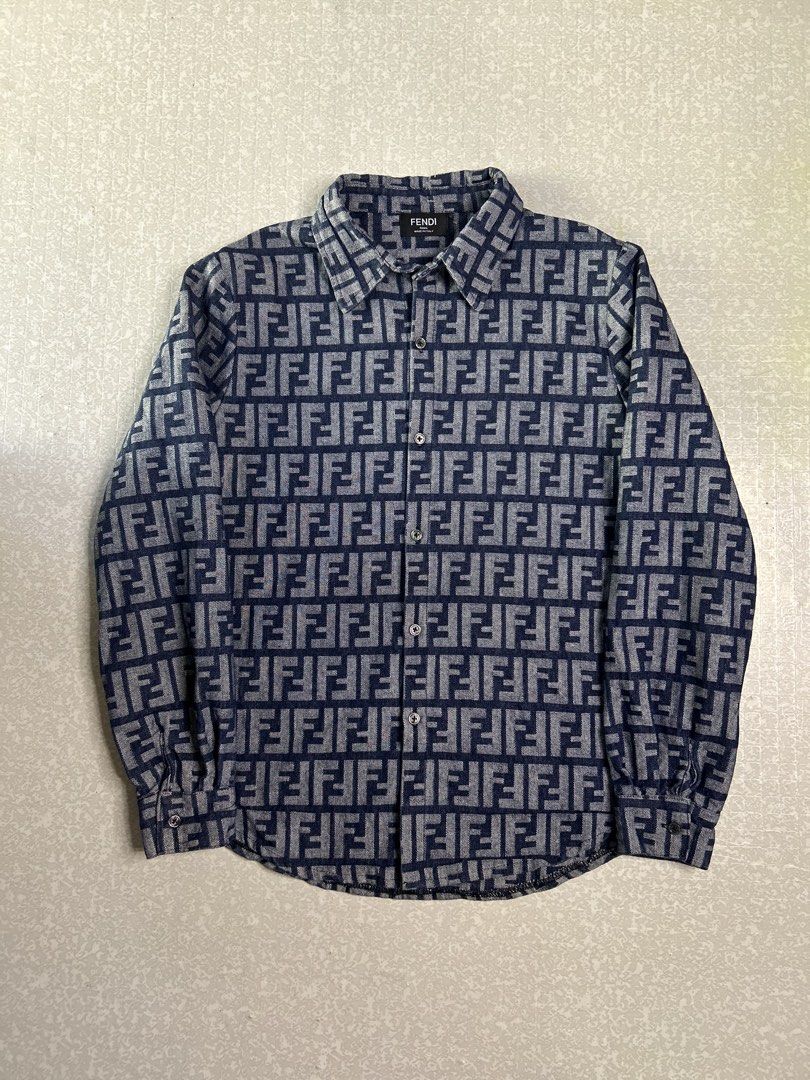 Fendi FF Monogram Denim Long Sleeve Shirt (Category: Luxury Apparel) located in Dasmarinas. Submitted by insaurigaj60770 (Listing ID 1468117078, Image 1). Description: - Authentic Fendi denim long sleeve button-up shirt - Eye-catching all-over blue and white FF monogram logo pattern - Classic collared neckline and button cuffs - Features official Fendi Roma neck label (Made in Italy) - Clean casual fit, perfect as a daily statement piece - Ships 