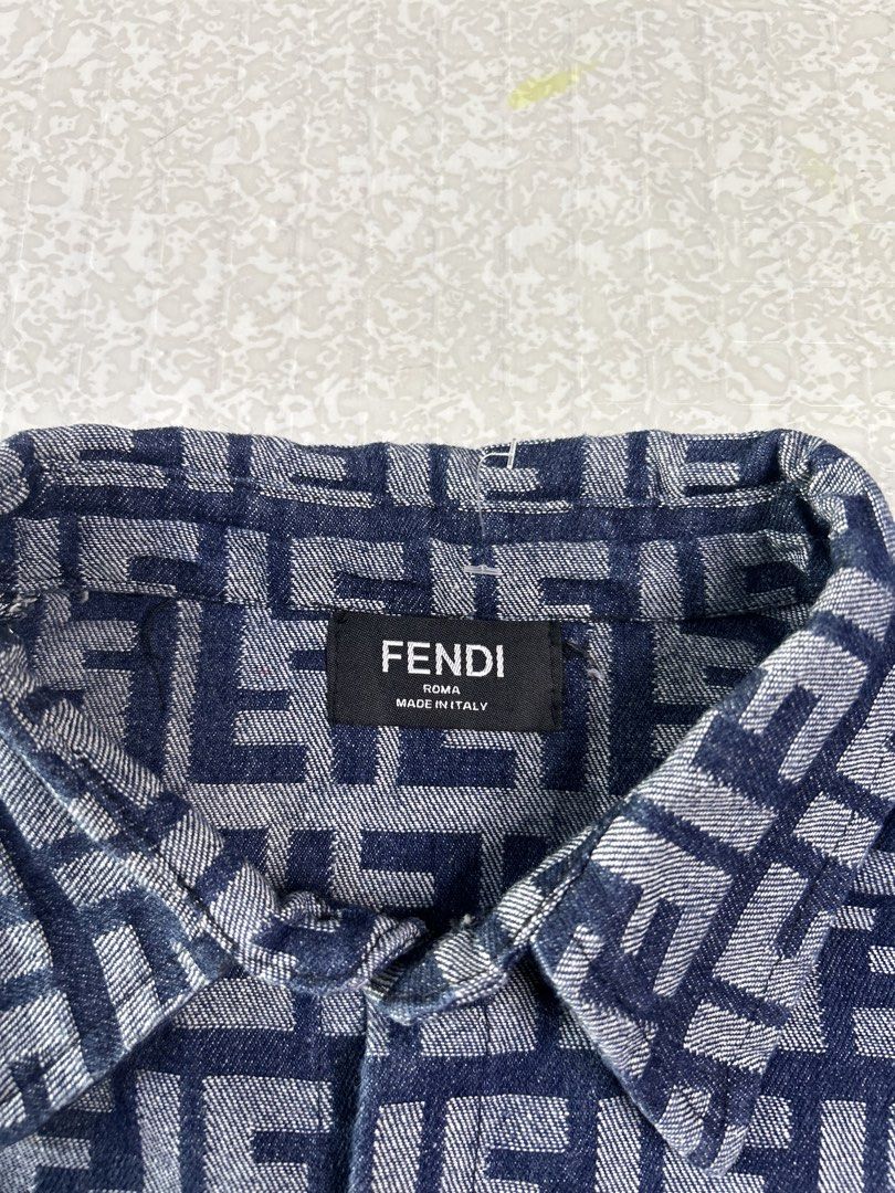 Fendi FF Monogram Denim Long Sleeve Shirt (Category: Luxury Apparel) located in Dasmarinas. Submitted by insaurigaj60770 (Listing ID 1468117078, Image 3). Description: - Authentic Fendi denim long sleeve button-up shirt - Eye-catching all-over blue and white FF monogram logo pattern - Classic collared neckline and button cuffs - Features official Fendi Roma neck label (Made in Italy) - Clean casual fit, perfect as a daily statement piece - Ships 