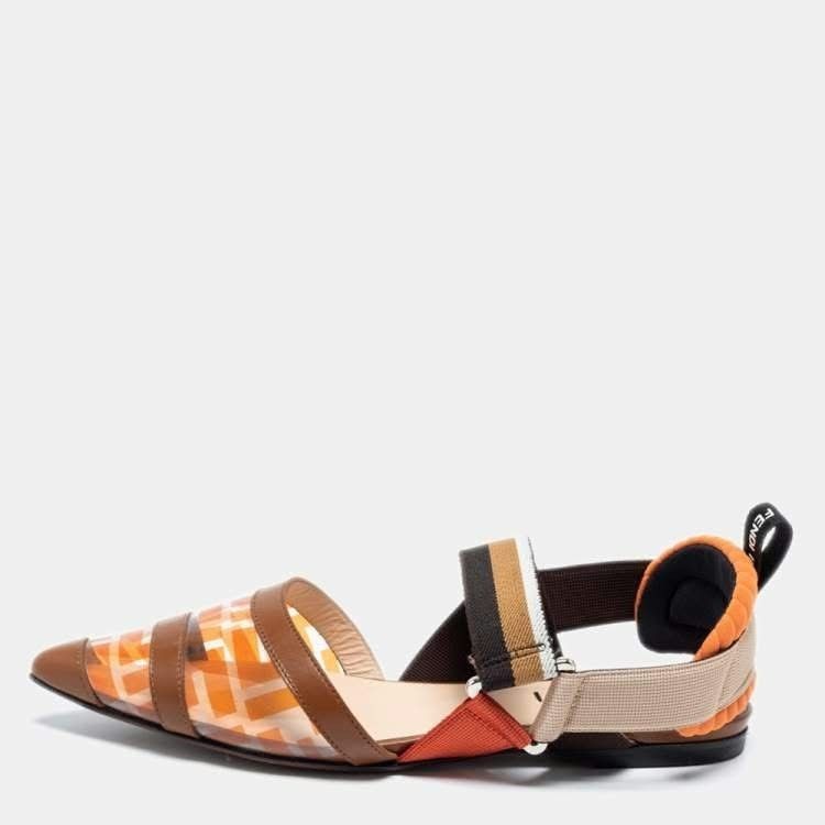 Fendi Transparent Orange Brown Pointed Toe Slingback Flats (Category: Flats & Sandals) located in Paranaque City. Submitted by calm_youngstore7 (Listing ID 1468066425, Image 3). Description: - Brand: Fendi - Style: Pointed toe flats with flat heel - Design: Transparent clear vinyl front with iconic monogram check print in orange and brown - Details: Leather trim, striped elasticated slingback strap, and cushioned heel collar with Fendi logo pull 