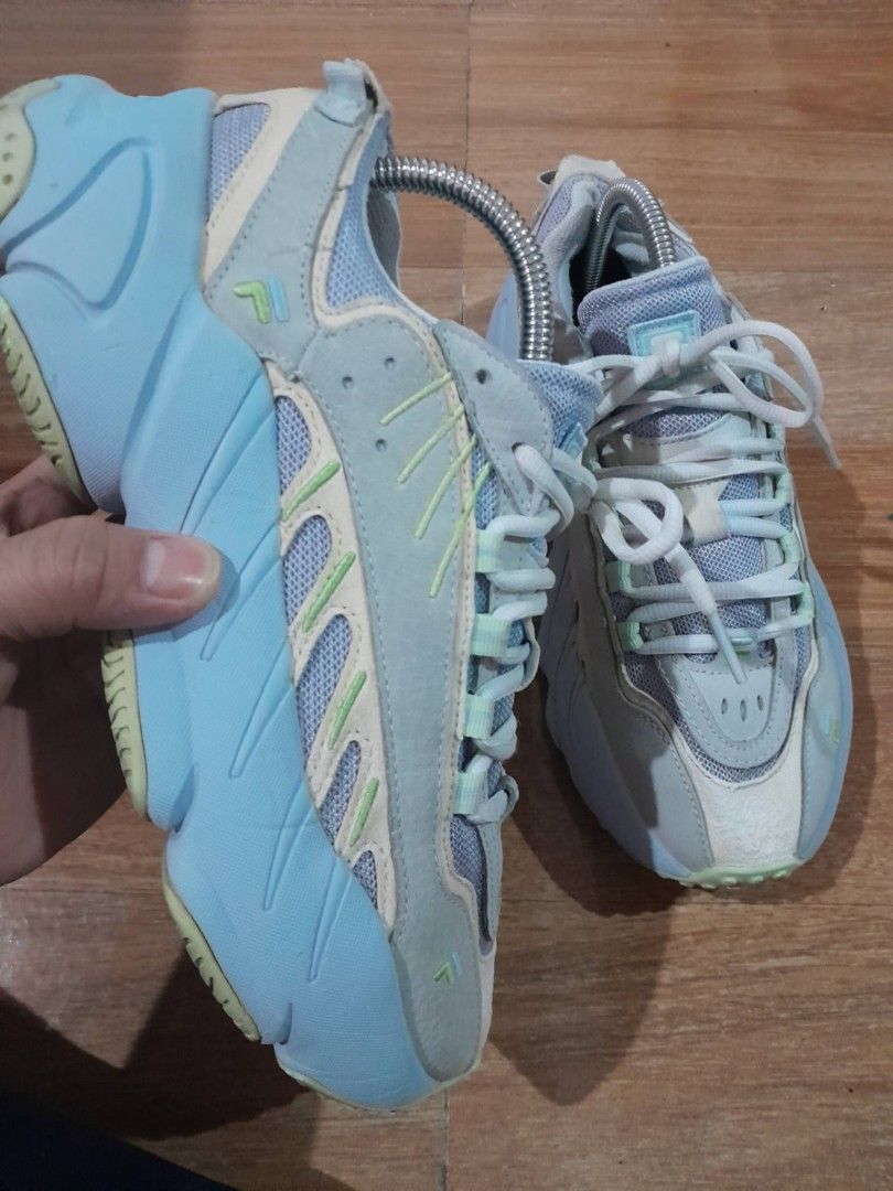 Fila Chunky Sneakers Light Blue Mint (Category: Sneakers) located in Calamba. Submitted by ysabellascloset17 (Listing ID 1468079022, Image 1). Description: - Brand: Fila chunky sneakers - Colorway: Light blue and mint green - Materials: Mesh and suede upper panels with traditional lace-up closure - Features: Comfortable padded collar and tongue, iconic Fila branding on tongue, side, and insole - Sole: Thick chunky sole with Goodyear branding and 