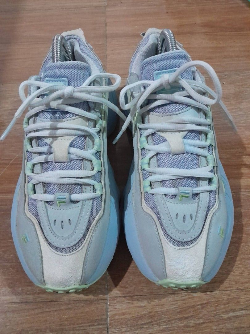Fila Chunky Sneakers Light Blue Mint (Category: Sneakers) located in Calamba. Submitted by ysabellascloset17 (Listing ID 1468079022, Image 2). Description: - Brand: Fila chunky sneakers - Colorway: Light blue and mint green - Materials: Mesh and suede upper panels with traditional lace-up closure - Features: Comfortable padded collar and tongue, iconic Fila branding on tongue, side, and insole - Sole: Thick chunky sole with Goodyear branding and 