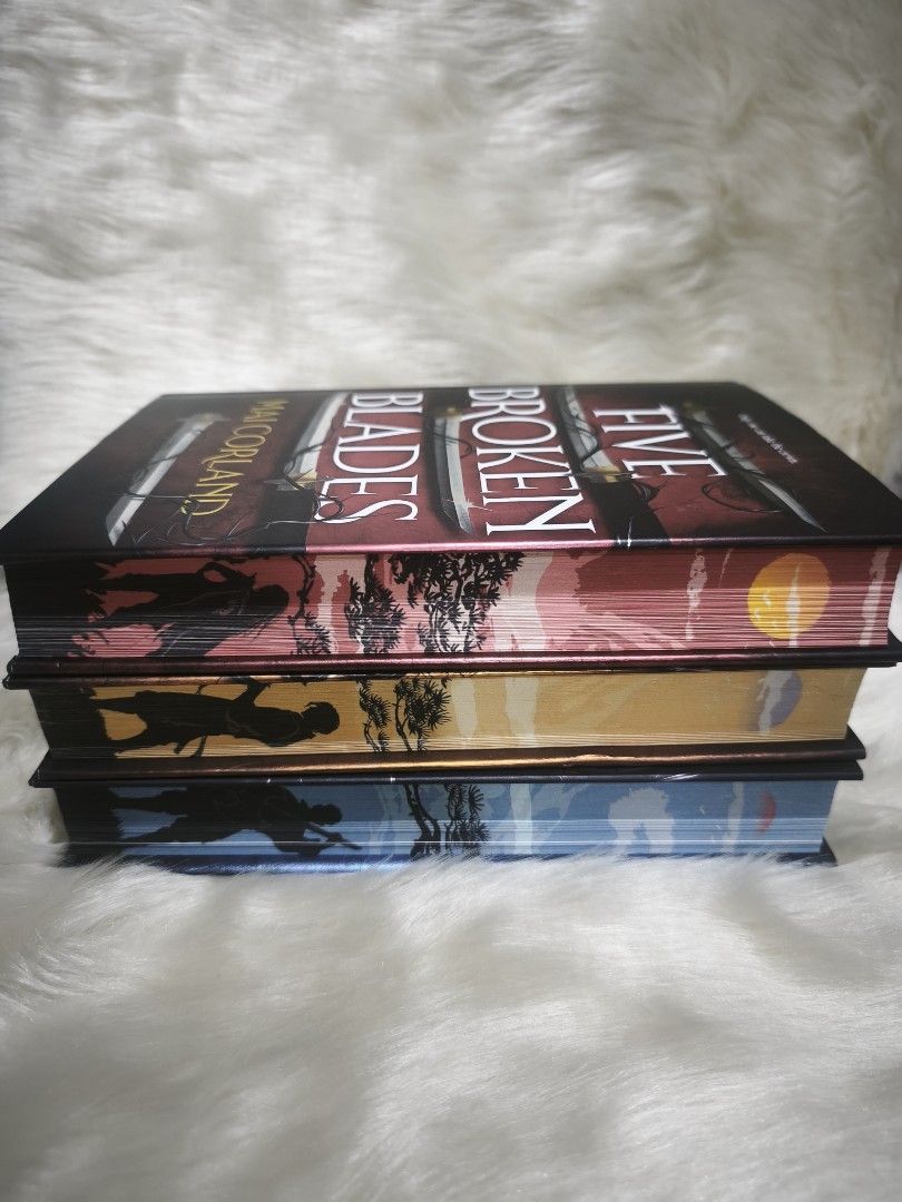 Five Broken Blades trilogy by Mai Corland (Category: Storybooks) located in Quezon City. Submitted by books.and.hobbiesph (Listing ID 1468199246, Image 2). Description: Brand new and brand new remaindered copy Special edition hardcover set (3 volumes) Custom illustrated endpapers, foil cover details, and pink, yellow, and blue sprayed edges.