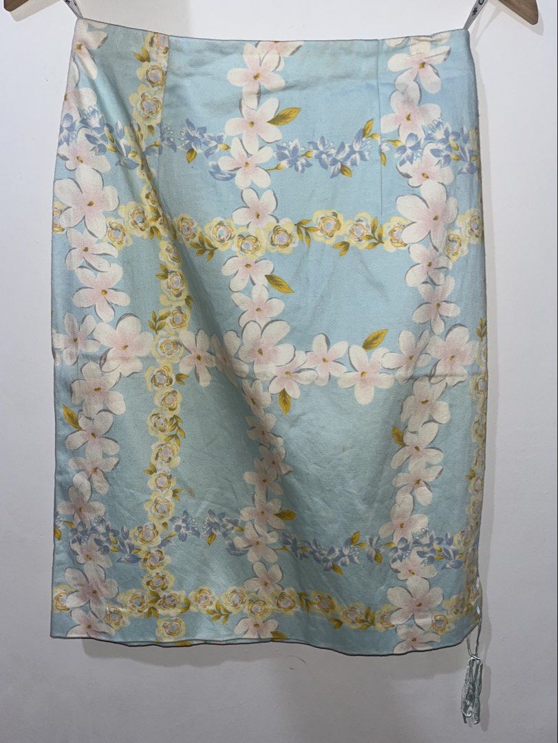 Floral Satin Midi Skirt (Category: Skirts) located in Santa Rosa. Submitted by lanadeldios (Listing ID 1468228828, Image 1). Description: Brand: ORIS Size: M Colour: Powder blue, pastel pink, yellow, white and blue Style: Floral pencil / straight skirt Details: Satin-like finish, all-over floral print, silver ribbon lace-up side detailing and concealed side fastening.