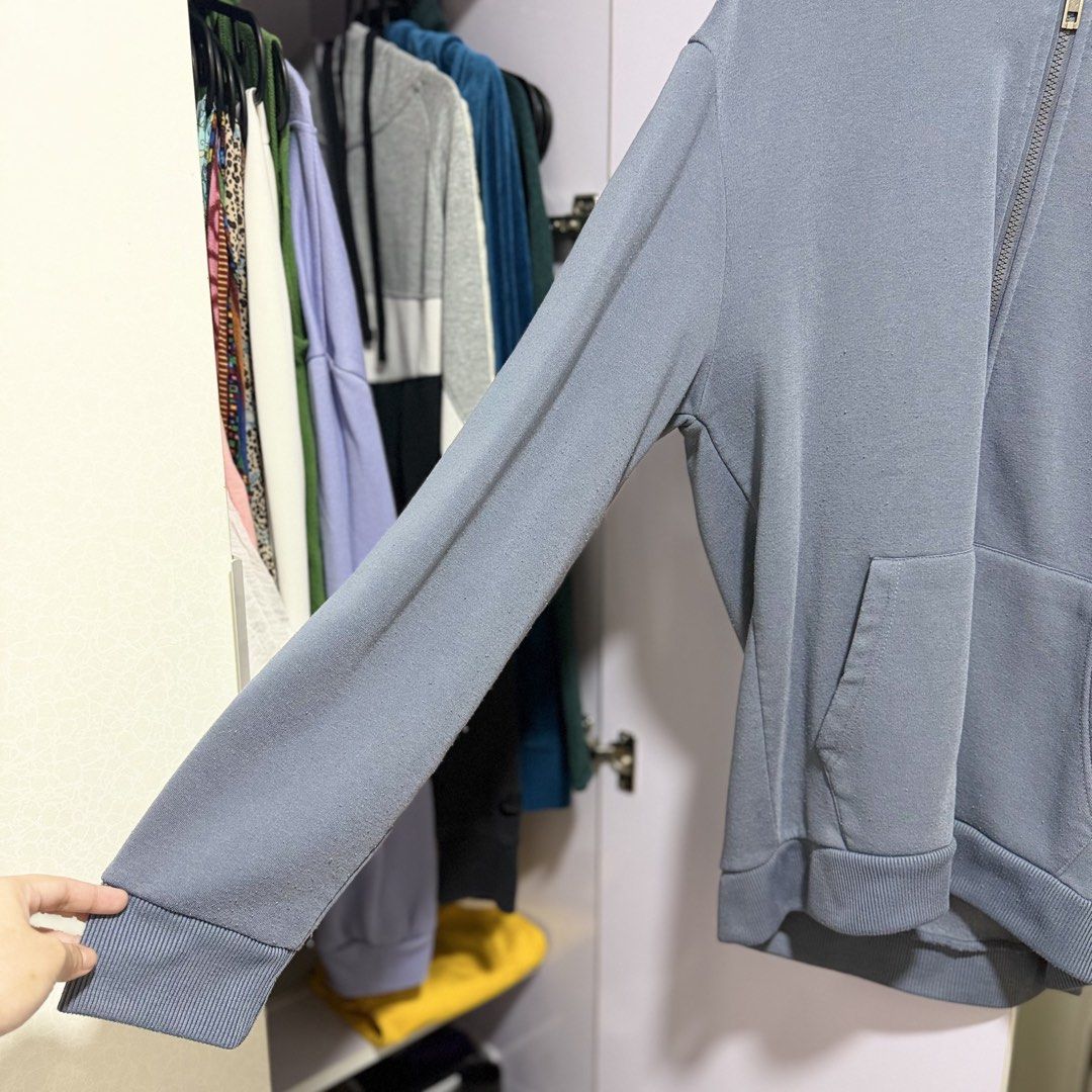 folded & hung light blue zip up hoodie (Category: Coats, Jackets and Outerwear) located in Cavite. Submitted by lovedbysham (Listing ID 1468274018, Image 2). Description: - Brand: Folded & Hung - Color: Gray - Size: Men's Medium - Features: Full front zipper with metallic hardware, attached hood, front kangaroo pocket, ribbed cuffs and hem - Interior: Comfortable fleece lining - Style: Casual everyday wear - Condition: Good overall condition.