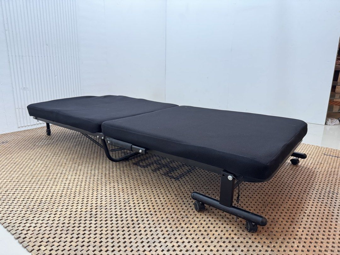 Folding Bed (Category: Bed Frames & Mattresses) located in Quezon City. Submitted by matetdevis13 (Listing ID 1468227844, Image 2). Description: Single Size Fabric Folding Bed Price: 4,900 35.5 x 79 x 12.5 In good condition Code JMD25-M240.