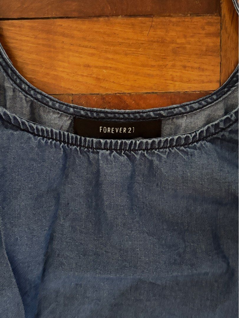 Forever 21 Denim Camisole Top (Category: Sleeveless) located in Las Pinas. Submitted by fwanchinee (Listing ID 1468119464, Image 2). Description: Can fit medium-large.