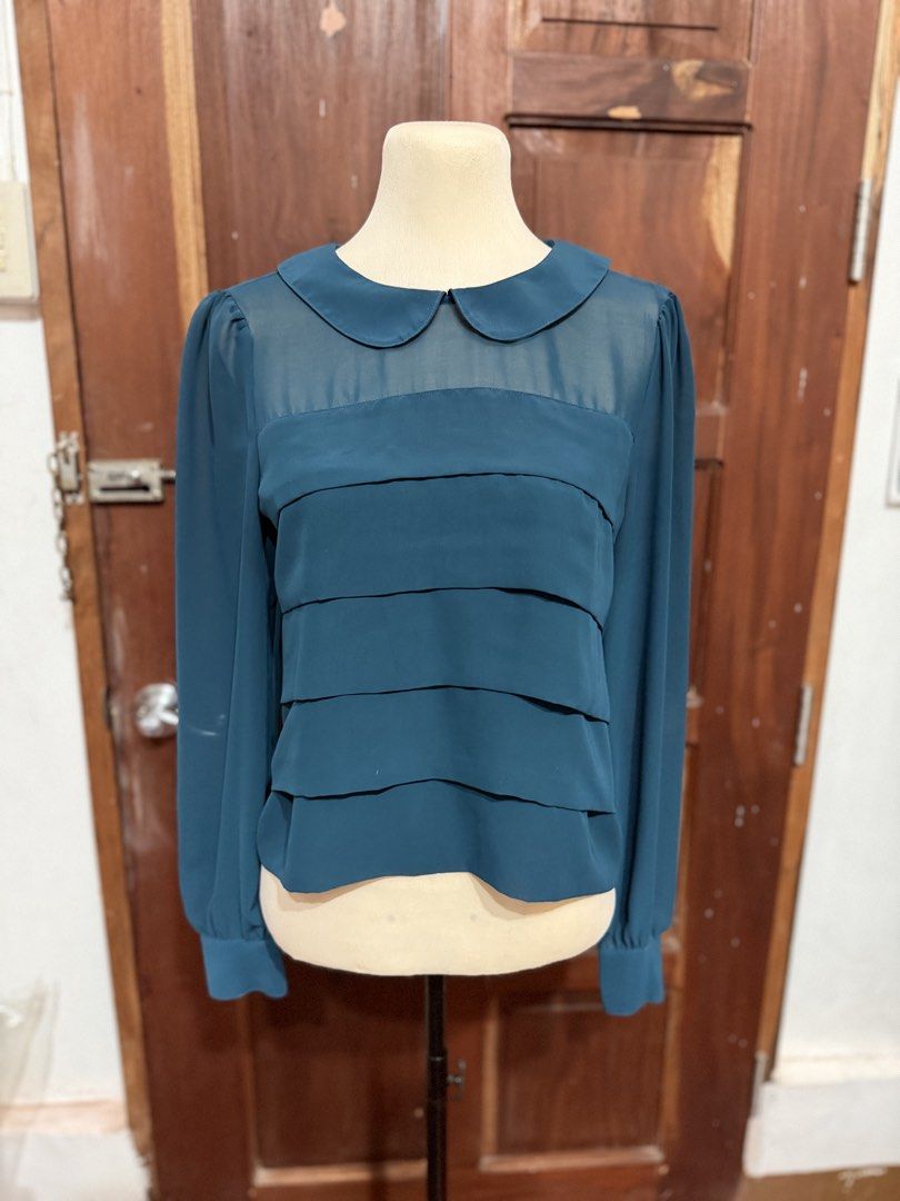 Forever 21 teal-colored long-sleeve blouse (Category: Longsleeves) located in Ozamiz City. Submitted by mhaeu95 (Listing ID 1468107252, Image 1). Description: Authentic bought this in japan .
