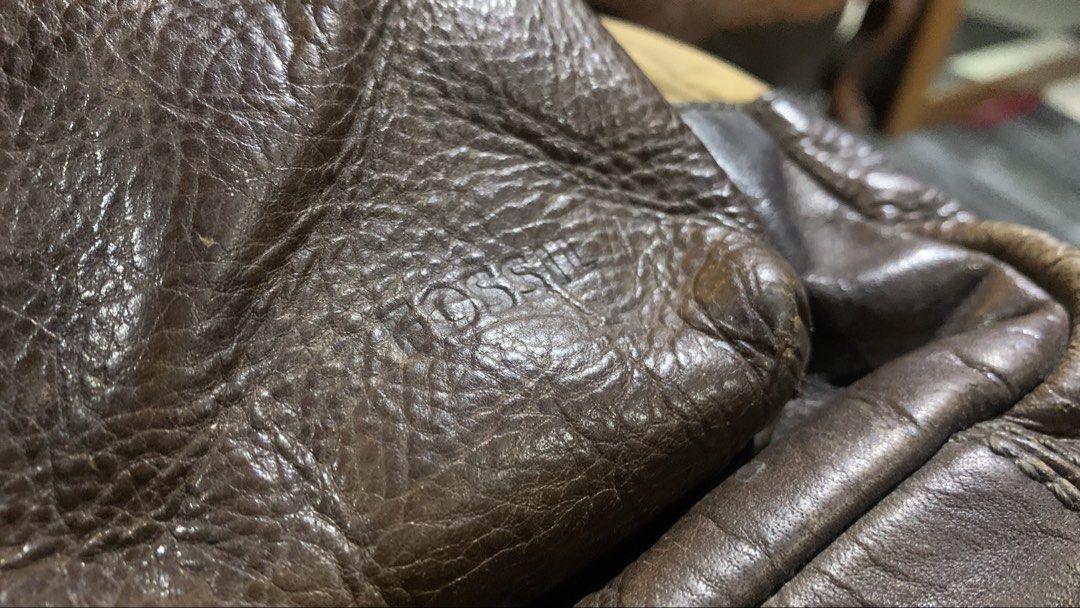 Fossil Leather and Canvas Backpack (Category: Backpacks) located in Santa Cruz, Pampanga. Submitted by vincent_2002 (Listing ID 1468065966, Image 3). Description: Selling an authentic Fossil genuine leather & canvas backpack in a classic vintage tan and dark espresso brown colorway. Key Features: Brand: Fossil (100% Authentic) Material: Heavy-duty canvas body with genuine leather front pocket, base, top handle, and shoulder straps Color: Tan / Kh