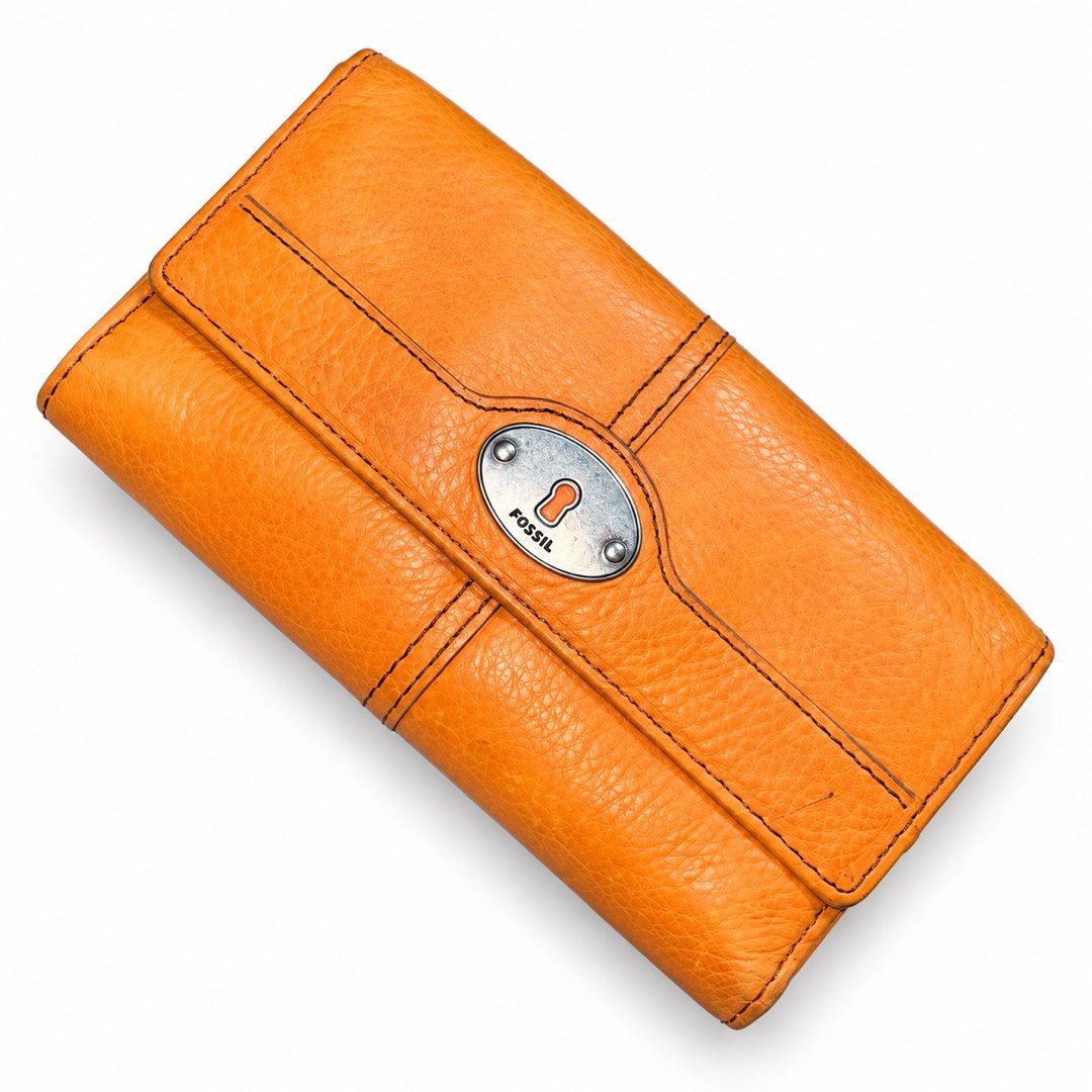 Fossil Orange Leather Wallet with Keyhole Clasp (Category: Wallets & Card holders) located in Carigara. Submitted by spark2503 (Listing ID 1468062925, Image 1). Description: - Brand: Fossil - Color: Bright orange - Material: Textured leather with contrast stitching - Closure: Front flap with keyhole hardware and snap button - Exterior: Back zipper pocket for small essentials - Interior: Multiple card slots, ID window, bill compartments, and starb