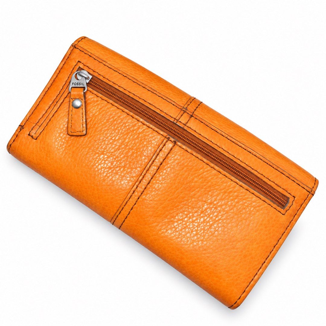 Fossil Orange Leather Wallet with Keyhole Clasp (Category: Wallets & Card holders) located in Carigara. Submitted by spark2503 (Listing ID 1468062925, Image 2). Description: - Brand: Fossil - Color: Bright orange - Material: Textured leather with contrast stitching - Closure: Front flap with keyhole hardware and snap button - Exterior: Back zipper pocket for small essentials - Interior: Multiple card slots, ID window, bill compartments, and starb