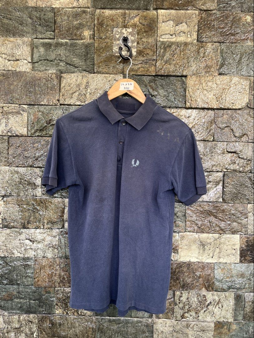 Fred Perry Navy Blue (Category: Tshirts & Polo Shirts ) located in Cagayan de Oro. Submitted by curatedheirloomph_ (Listing ID 1468117128, Image 1). Description: 𝘿𝙞𝙢𝙚𝙣𝙨𝙞𝙤𝙣𝙨: 19x26 𝘽𝙚𝙨𝙩 𝙁𝙞𝙩: Small - Medium 𝘾𝙤𝙣𝙙𝙞𝙩𝙞𝙤𝙣 & 𝘾𝙤𝙡𝙤𝙧 𝙍𝙖𝙩𝙚: Good (8.5/10) 𝙄𝙨𝙨𝙪𝙚: Missing tags, stain.