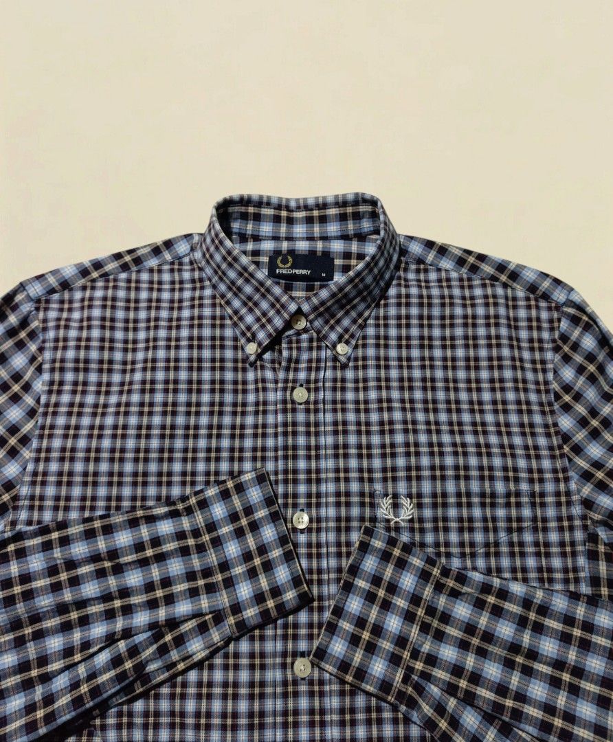 Fred Perry Plaid Button-Down Shirt Size M (Category: Tshirts & Polo Shirts ) located in Marikina City. Submitted by oldfits14 (Listing ID 1468232031, Image 1). Description: FRED PERRY POLO LONG SLEEVE BUTTON DOWN (Checkered) - 100% Legit/Authentic ▫️Color may vary due to lighting ▫️Dimes: 20 x 28 ▫️Color rate: 10/10 ▫️As New Condition ▫️No Issue ▫️Already washed .