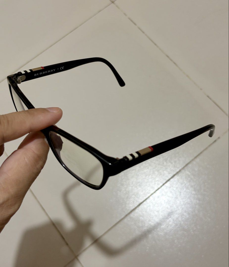 FS : Authentic Burberry prescription eyeglasses (black frame) (Category: Sunglasses & Eyewear) located in Quezon City. Submitted by baessist_z (Listing ID 1468178685, Image 2). Description: FS : Authentic Burberry prescription eyeglasses (black frame) Meetups : SM Fairview or Trinoma/SM North. Burberry optical frames, model B 2144 3001. Black acetate construction. Classic Burberry check pattern detail on the temples. Size 53-16-140. Includes orig