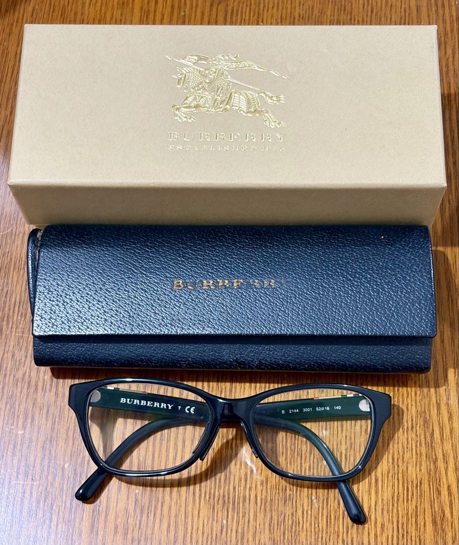 FS : Authentic Burberry prescription eyeglasses (black frame) (Category: Sunglasses & Eyewear) located in Quezon City. Submitted by baessist_z (Listing ID 1468178685, Image 1). Description: FS : Authentic Burberry prescription eyeglasses (black frame) Meetups : SM Fairview or Trinoma/SM North. Burberry optical frames, model B 2144 3001. Black acetate construction. Classic Burberry check pattern detail on the temples. Size 53-16-140. Includes orig