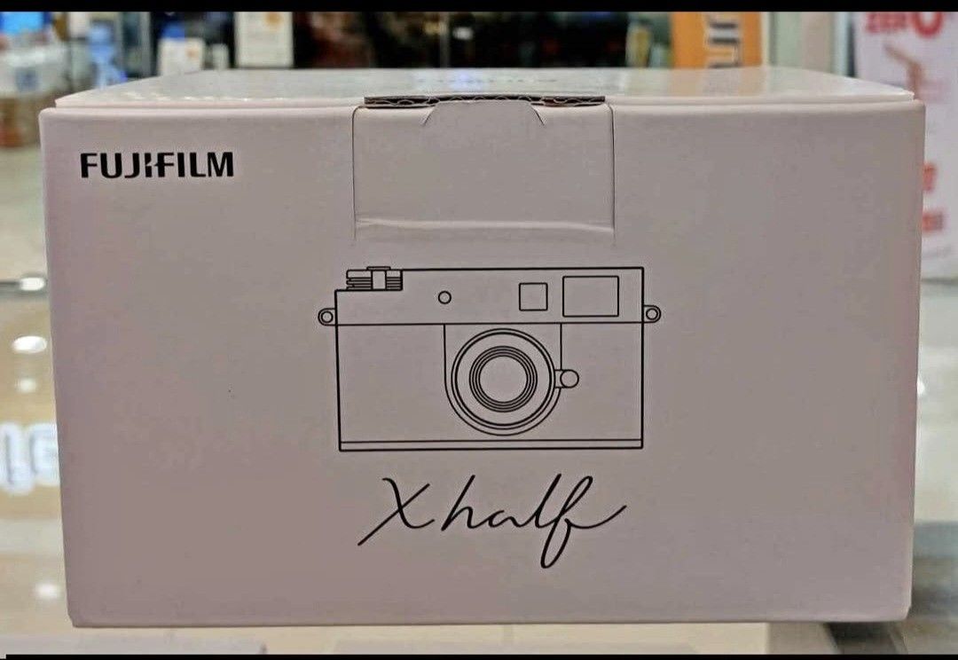 Fujifilm X half (Category: Cameras) located in Mandaluyong City. Submitted by hanchi0001 (Listing ID 1468175756, Image 1). Description: almost new, barely used, complete box, accessories, receipt.