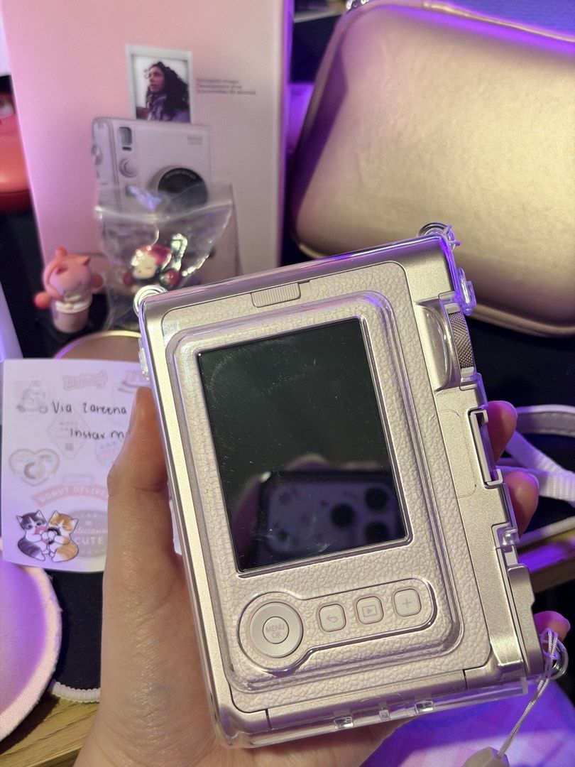 Fujifilm Instax Mini Evo - Gentle Rose (Category: Cameras) located in General Trias. Submitted by viabulda (Listing ID 1468122291, Image 3). Description: for sale wts lfb fujifilm instax mini evo rfs: hindi nagagamit since merong other cameras ₱10k ♡ used thrice only ♡ with screenguard and case since day 1 ♡ box, cord, strap included ♡ with accessories and hard case Can meet up: ♡ near Lancaster, Evo City Kawit, Maple Grove, Robinsons General Tri