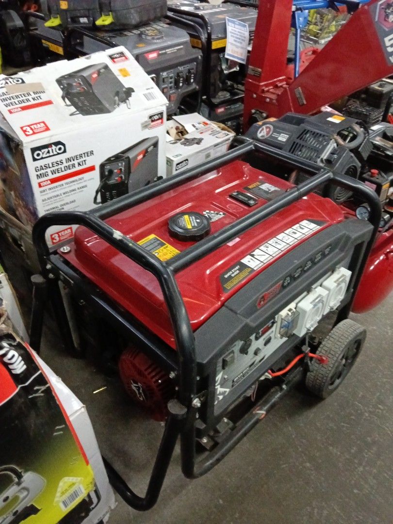 Full Boar 8000W Petrol Generator (Category: Industrial Equipment) located in Manila. Submitted by jesicahmrsantarosa (Listing ID 1468141914, Image 3). Description: - Brand: Full Boar 8KVA OHV Petrol Generator - Power: 8000 max watts / 7200 running watts - Design: Heavy-duty black steel frame with red fuel tank - Ports: Dual AC power outlets and 12V DC USB ports - Portability: Built-in wheel kit for easy moving - Condition: Sturdy build, ready for