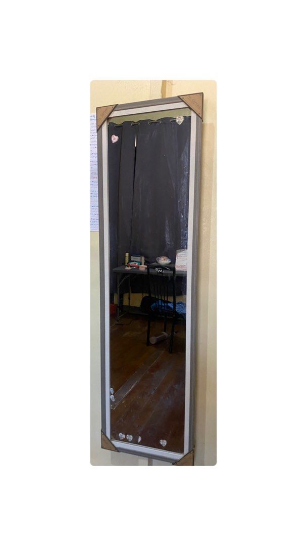 Full length rectangular wall mirror with grey wood frame (Category: Mirrors) located in Manila. Submitted by camsvallejos_ (Listing ID 1468091431, Image 1). Description: No issue - Full-length rectangular wall mirror - Stylish grey wooden frame - Protective corner guards still attached - Clear, high-quality reflection - Clean and ready to hang - Ideal for bedrooms or entryways Price still negotiable, pm if interested! 🥰.