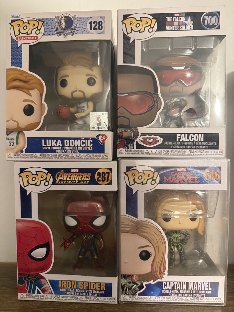 Funko Pop Figures Luka Doncic Falcon Iron Spider Captain Marvel (Category: Designer & Blind Box Toys) located in Makati City. Submitted by mattieeeedom (Listing ID 1468205590, Image 1). Description: - Set of 4 collectible Funko Pop vinyl figures - Includes NBA Mavericks Luka Doncic (#128), Falcon and the Winter Soldier (#700), Avengers Infinity War Iron Spider (#287), and Captain Marvel (#516) - Condition: Clean boxes with clear windows and intac