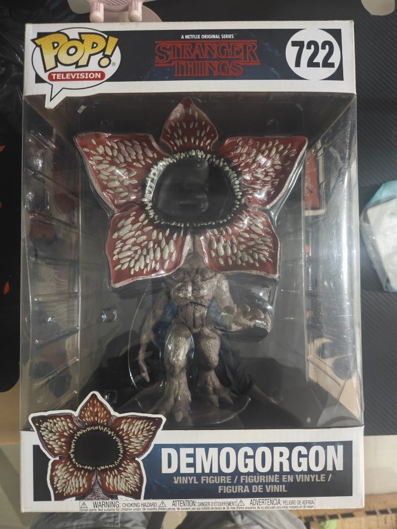 Funko Pop Stranger Things Demogorgon / Suzie (Category: Figurines & Statues) located in Taguig. Submitted by elmomomoshi (Listing ID 1468251758, Image 1). Description: - Item: Funko Pop! Television Demogorgon (#722) - Series: Stranger Things (Netflix) - Back Art: Features other characters like Eleven and Steve - Condition: Brand new in box, never opened - Perfect for Funko collectors and Stranger Things fans! 9.5/10 BOX CONDITION Location: Taguig
