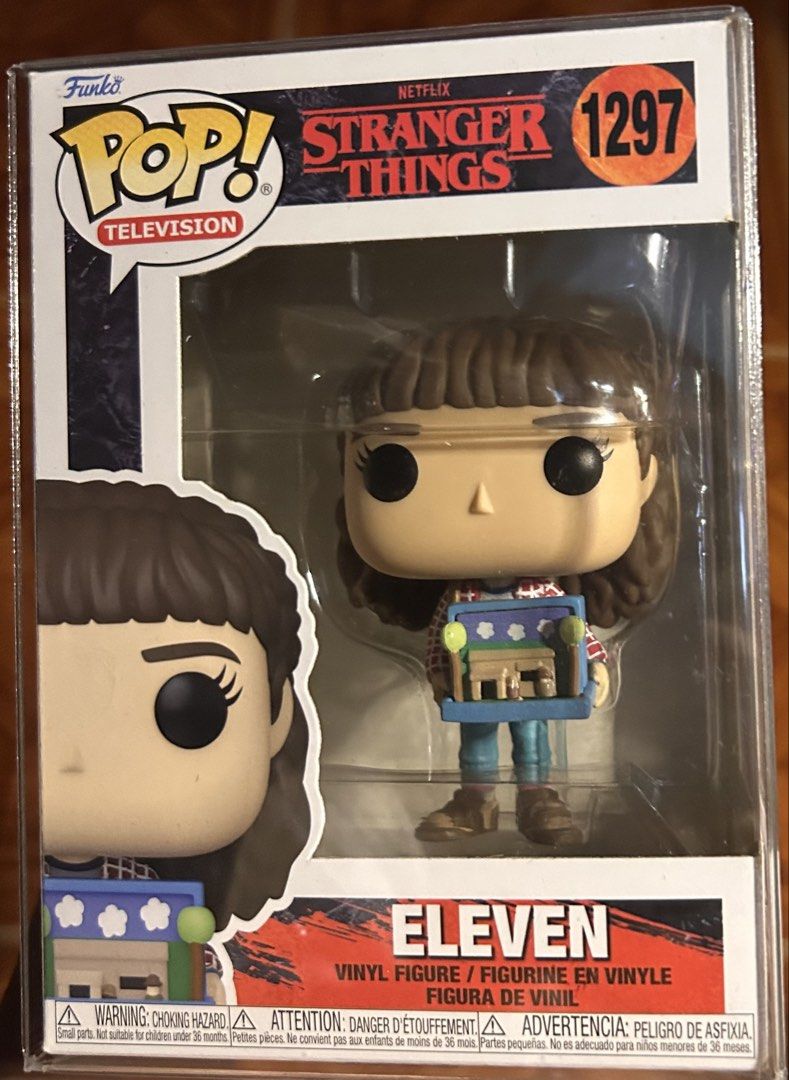 FUNKO POP STRANGER THINGS ELEVEN 1297 (Category: Designer & Blind Box Toys) located in Pasig City. Submitted by ssalgnowk (Listing ID 1468134382, Image 1). Description: - Item: Funko Pop! Television - Stranger Things Eleven (No. 1297) - Feature: Holding a diorama box - Condition: Brand new with clear plastic protector case included - Perfect for: Netflix Stranger Things fans and Funko collectors - NEVER OUTSIDE OF BOX, dirt due to storage - add ₱