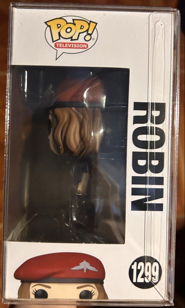 FUNKO POP STRANGER THINGS ROBIN 1299 (Category: Designer & Blind Box Toys) located in Pasig City. Submitted by ssalgnowk (Listing ID 1468133488, Image 2). Description: - Character: Robin from Stranger Things Season 4 (Camouflage uniform with red beret) - Collectible Number: #1299 - Packaging: Comes in original box with clear display window and Netflix branding - Perfect for Funko Pop and Stranger Things collectors - NEVER OUTSIDE OF BOX, dirt due