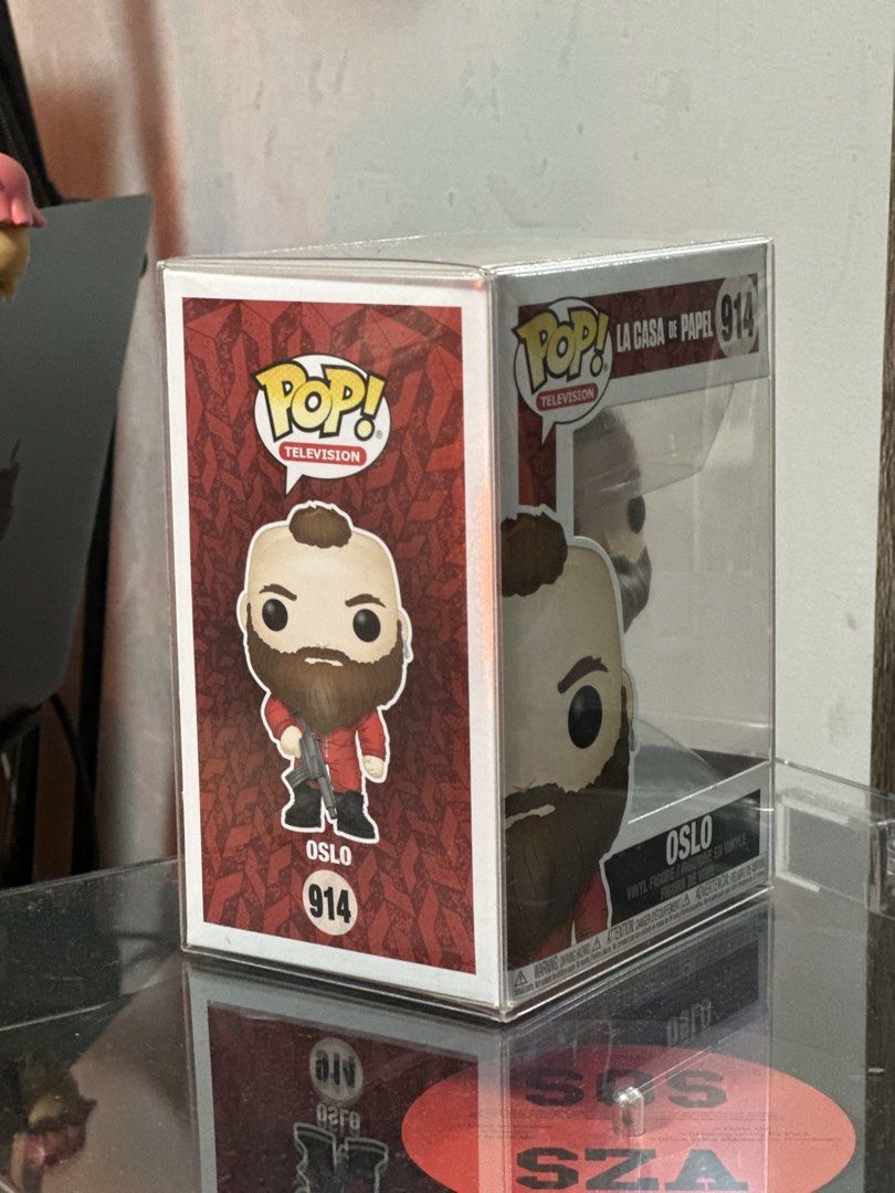Funko Pop Television La Casa De Papel Oslo (Category: Designer & Blind Box Toys) located in General Trias. Submitted by marbyndln (Listing ID 1468267021, Image 2). Description: - Item: Funko Pop La Casa De Papel - Oslo (#914) - Condition: Mint, with clean window and sharp corners - Protection: Includes original box inside a clear protective plastic case - Storage: Carefully stored away from direct sunlight - Ideal for: Money Heist fans and seriou