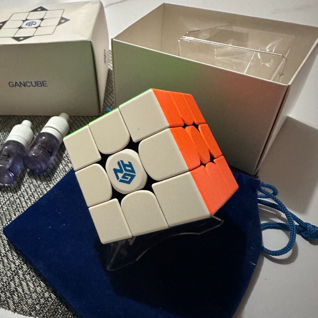 GAN 356 M (3x3 Magnetic Speed Cube) (Category: Board Games & Puzzles) located in Manila. Submitted by kingstephe58383 (Listing ID 1468246638, Image 2). Description: For Sale: GAN 356 M (3x3 Magnetic Speed Cube) - Complete Full specs: https://www.gancube.com/products/gan356m-advanced-magnetic-speed-cube 📦 Inclusions: • Includes original box and accessories • 3 pcs Standard lube • 3 pcs Rubik's cube stand **Issue: No issue **Condition: 9/10 Barely