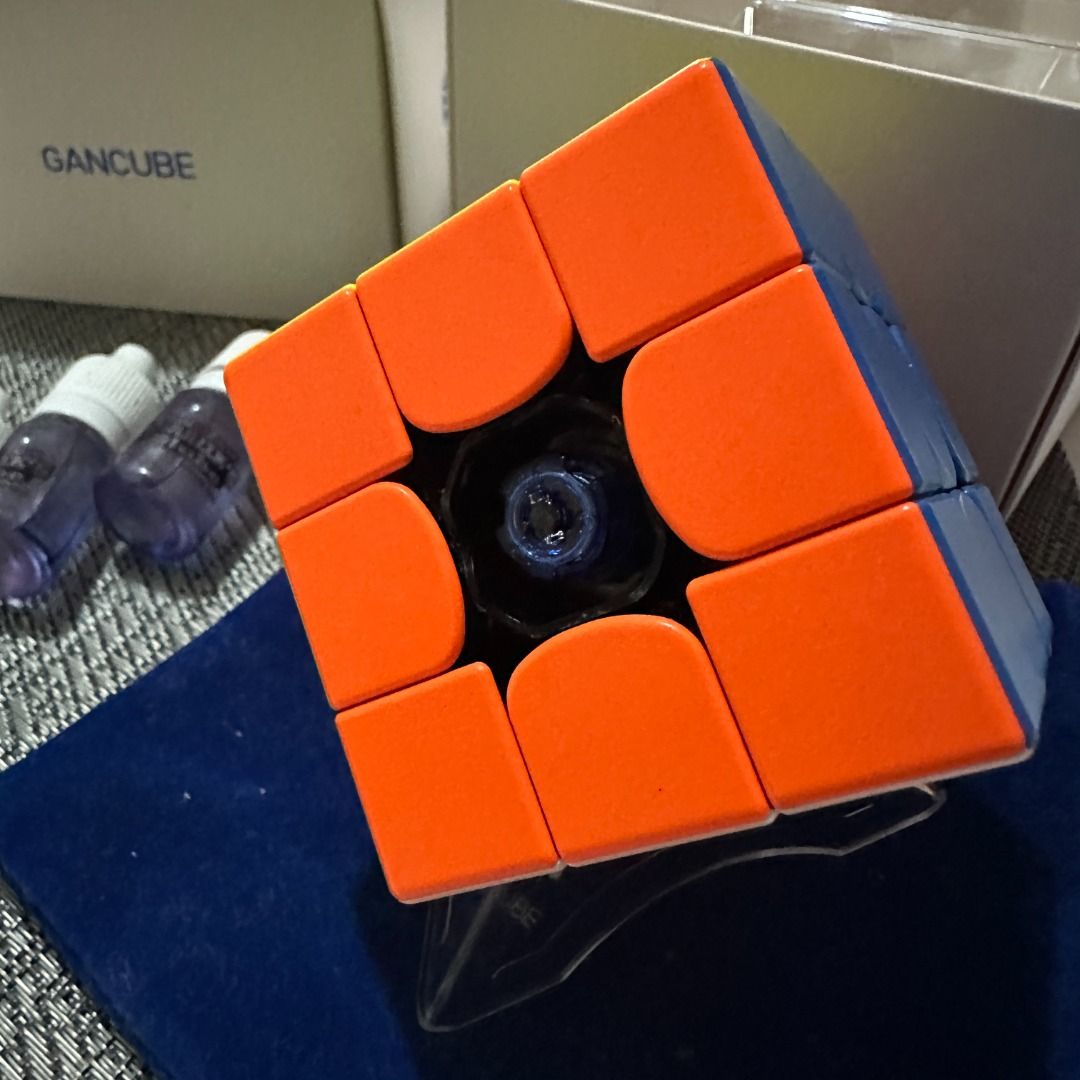 GAN 356 M (3x3 Magnetic Speed Cube) (Category: Board Games & Puzzles) located in Manila. Submitted by kingstephe58383 (Listing ID 1468246638, Image 3). Description: For Sale: GAN 356 M (3x3 Magnetic Speed Cube) - Complete Full specs: https://www.gancube.com/products/gan356m-advanced-magnetic-speed-cube 📦 Inclusions: • Includes original box and accessories • 3 pcs Standard lube • 3 pcs Rubik's cube stand **Issue: No issue **Condition: 9/10 Barely