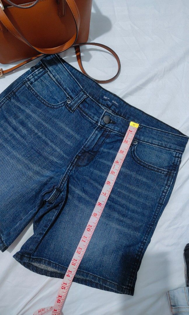 Gap Aubrey Denim Shorts Blue Size US (Category: Shorts) located in Bacolor. Submitted by annjjjjj (Listing ID 1468081410, Image 3). Description: - Brand: Gap Aubrey - Wash: Medium blue with faded finish on thighs - Rise: Mid-rise - Features: Classic five-pocket setup, front button, zip fly closure, and belt loops - Fit: True to standard denim sizing - Condition: Great casual staple for warm weather.