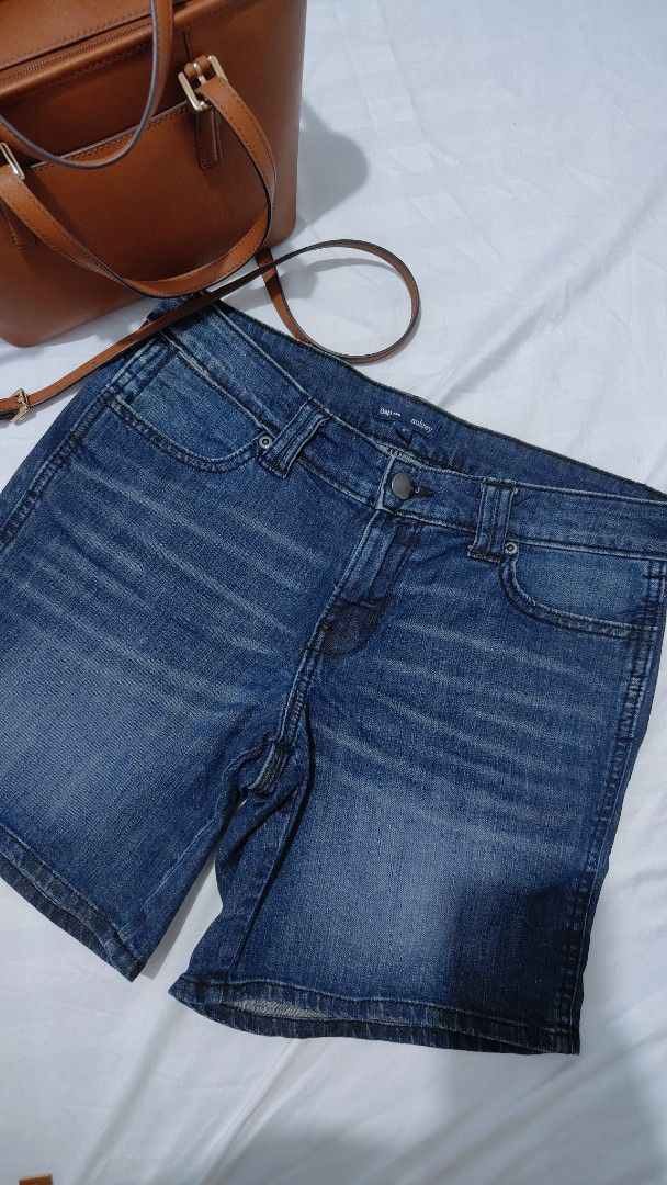 Gap Aubrey Denim Shorts Blue Size US (Category: Shorts) located in Bacolor. Submitted by annjjjjj (Listing ID 1468081410, Image 1). Description: - Brand: Gap Aubrey - Wash: Medium blue with faded finish on thighs - Rise: Mid-rise - Features: Classic five-pocket setup, front button, zip fly closure, and belt loops - Fit: True to standard denim sizing - Condition: Great casual staple for warm weather.