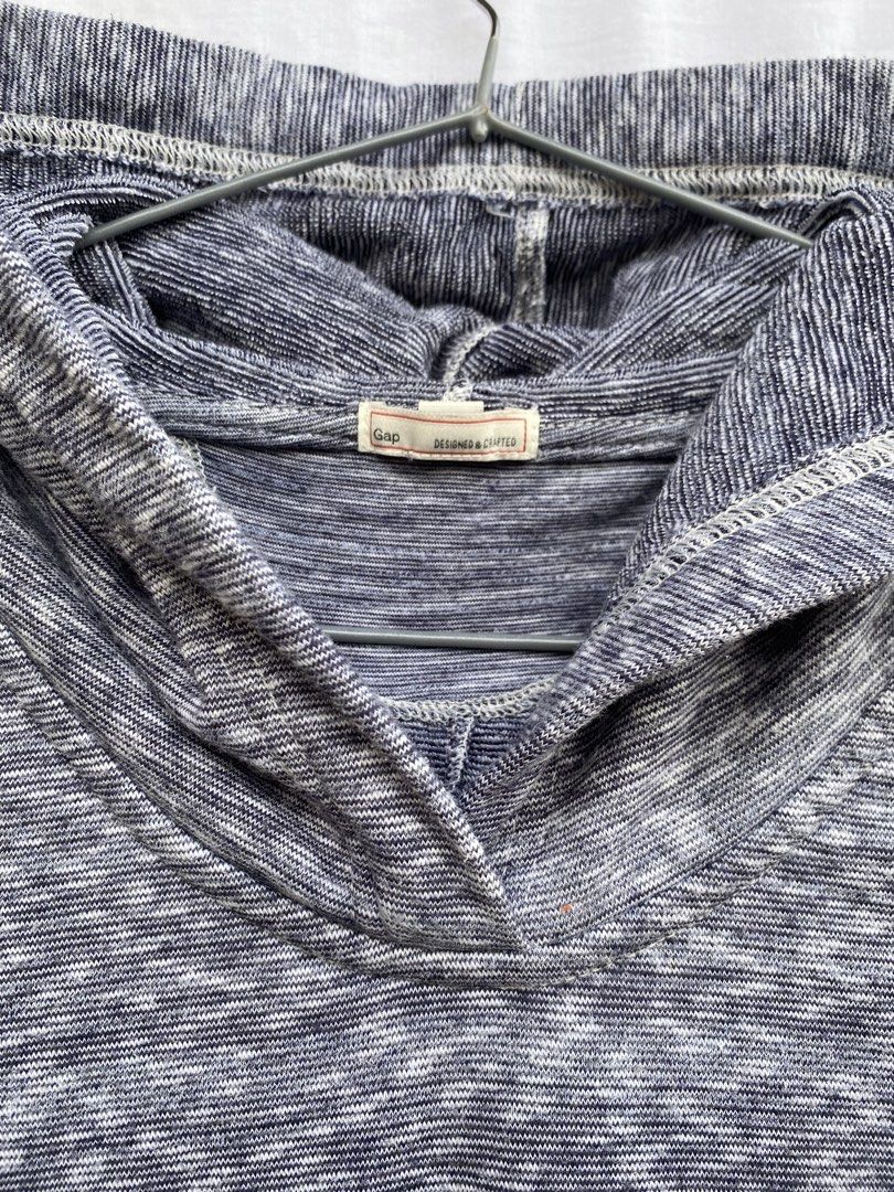 Gap Designed & Crafted Heathered Blue Grey Hoodie (Category: Coats, Jackets and Outerwear) located in Baguio. Submitted by royalriver17 (Listing ID 1468123957, Image 2). Description: - Brand: Gap - Style: Pullover hoodie with relaxed cowl neck and small side slits - Color/Pattern: Heathered blue and grey marled knit - Material: Soft, textured fabric - Condition: Great pre-loved condition, no major flaws spotted - Perfect for: Casual, everyday wea