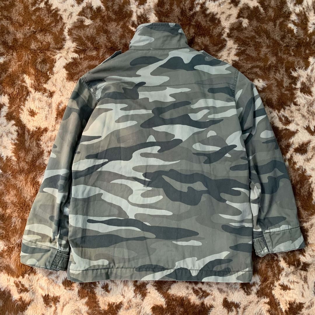 Gap Kids Camouflage Jacket (Category: Coats, Jackets and Outerwear) located in Cabanatuan. Submitted by sfracks (Listing ID 1468101036, Image 2). Description: Decluttering because I’m moving out! Must be gone or will be donated! Even if the items are for kids, can still fit small to medium size for adults (5'4 below) - Gap Kids Camo - Width 21.5 - Length 26.5 - Length of sleeve 20 - Pay first before shipping - Negotiable .