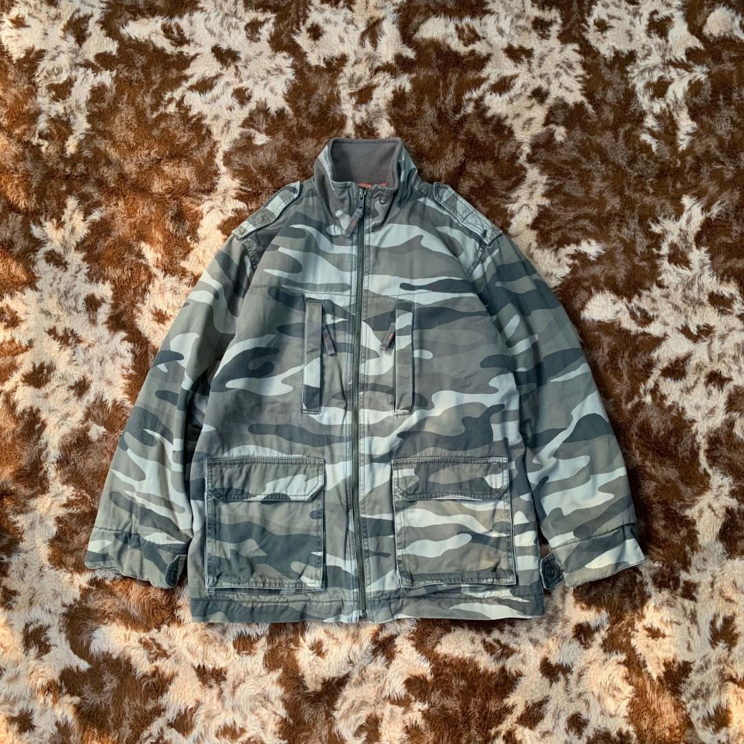 Gap Kids Camouflage Jacket (Category: Coats, Jackets and Outerwear) located in Cabanatuan. Submitted by sfracks (Listing ID 1468101036, Image 1). Description: Decluttering because I’m moving out! Must be gone or will be donated! Even if the items are for kids, can still fit small to medium size for adults (5'4 below) - Gap Kids Camo - Width 21.5 - Length 26.5 - Length of sleeve 20 - Pay first before shipping - Negotiable .