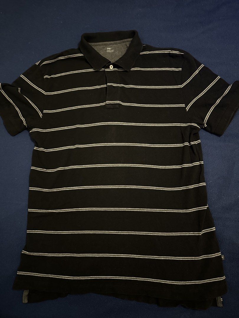 Gap polo shirt (Category: Tshirts & Polo Shirts ) located in Quezon City. Submitted by mancave_stuff (Listing ID 1468186680, Image 1). Description: Gap Black polo shirt Size L: 20” x 28” Black with white stripes Honeycomb fabric Color rate 8/10 No issues.
